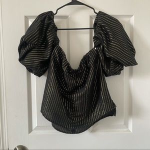 Off the shoulder black and gold shirt